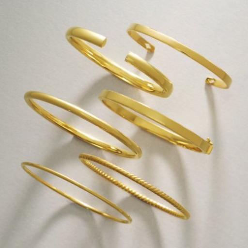 two silver bracelets from the jeweler bench