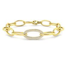 An 18K gold chain bracelet featuring a natural diamond accented jump ring with a pave setting.